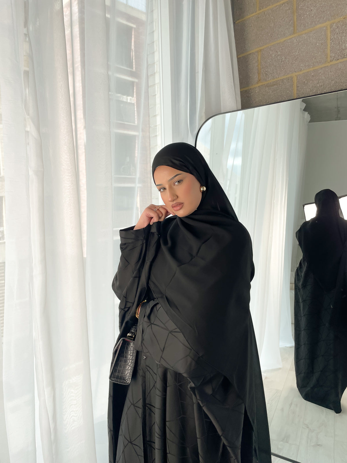 Tranquility in Black Abaya