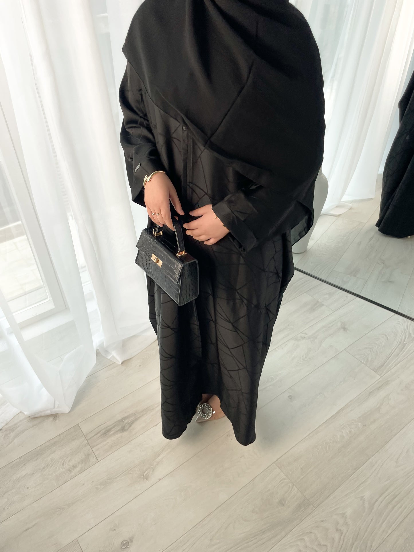 Tranquility in Black Abaya