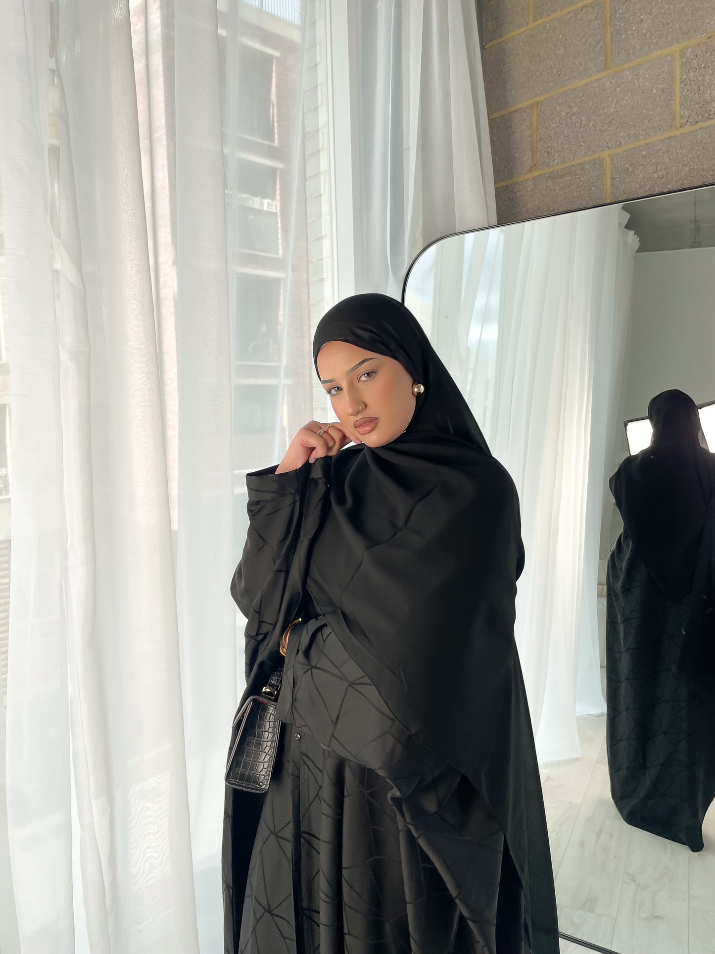 Tranquility in Black Abaya