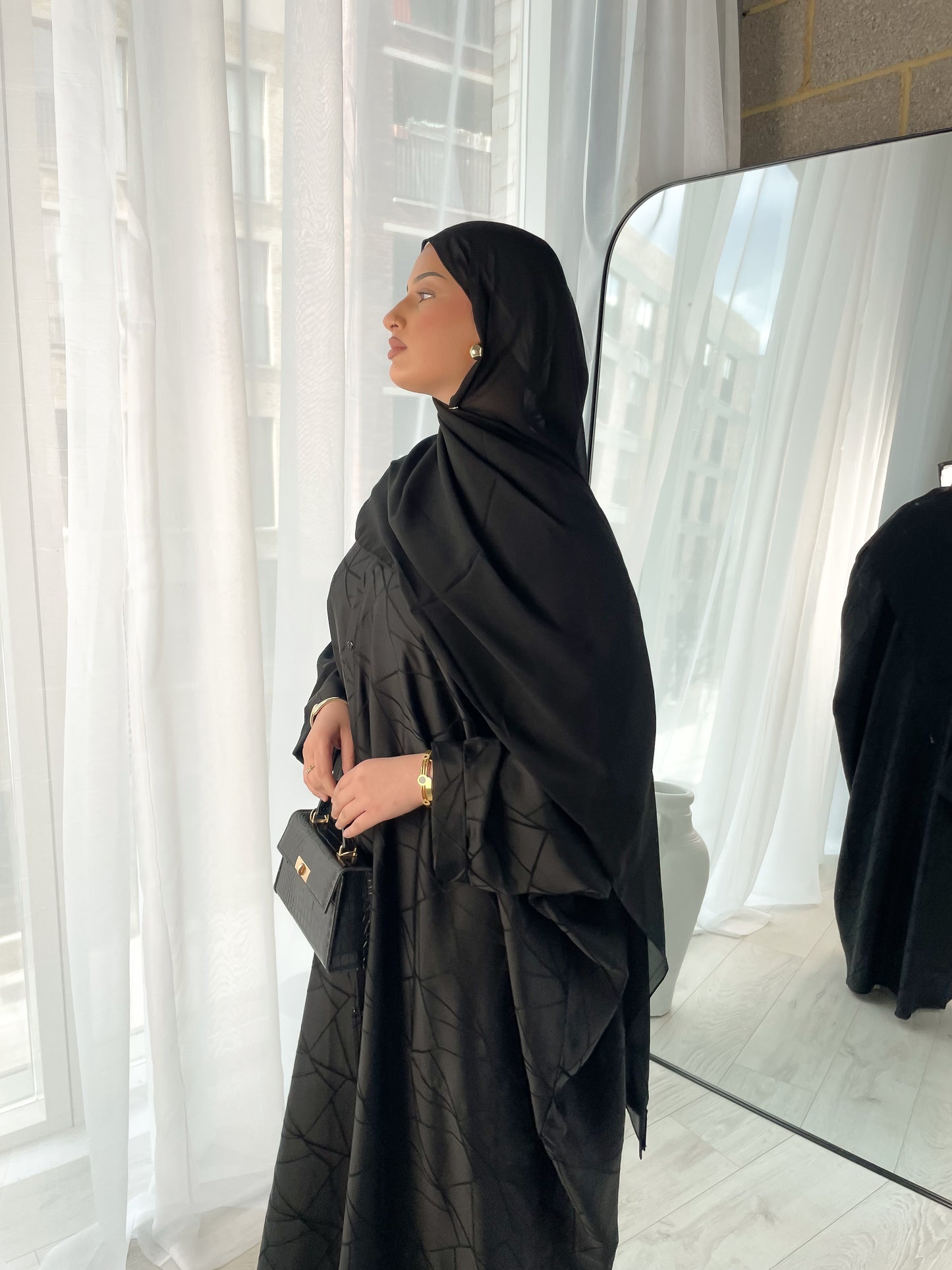 Tranquility in Black Abaya